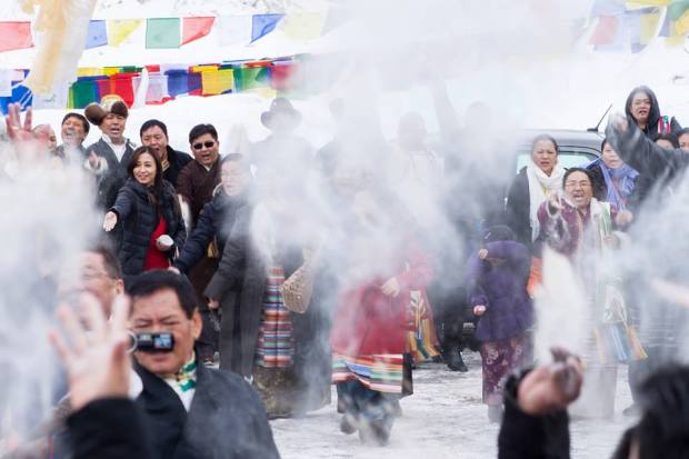 Tibetans partake in sangsol during the 3rd day of Losar in MN, 2014.